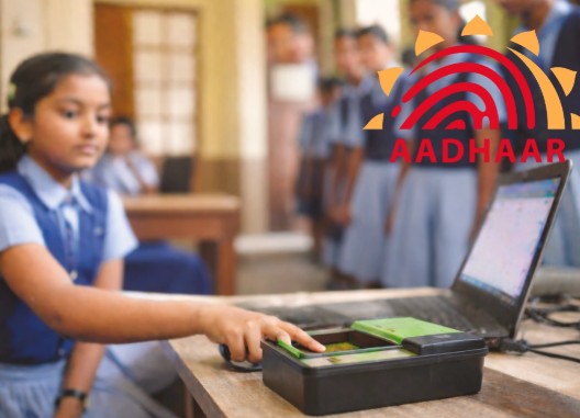 UIDAI biometric updates, Aadhaar children update, 1 crore MBUs completed, school Aadhaar update drive, Aadhaar UDISE integration, free biometric updates ages 7–15, education news, NEP 2020
