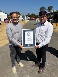 IIT Kanpur Guinness World Record, e-bicycle delivery record, sustainable transport initiative, electric bicycles India, Kuppam Area Development Authority, EMotorad partnership, clean mobility solutions, education news, NEP 2020